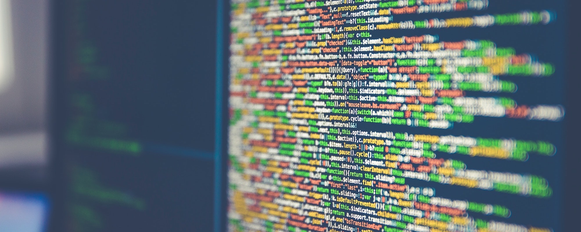 Close-up of a code editor on screen representing Argo Apps building focused AI products